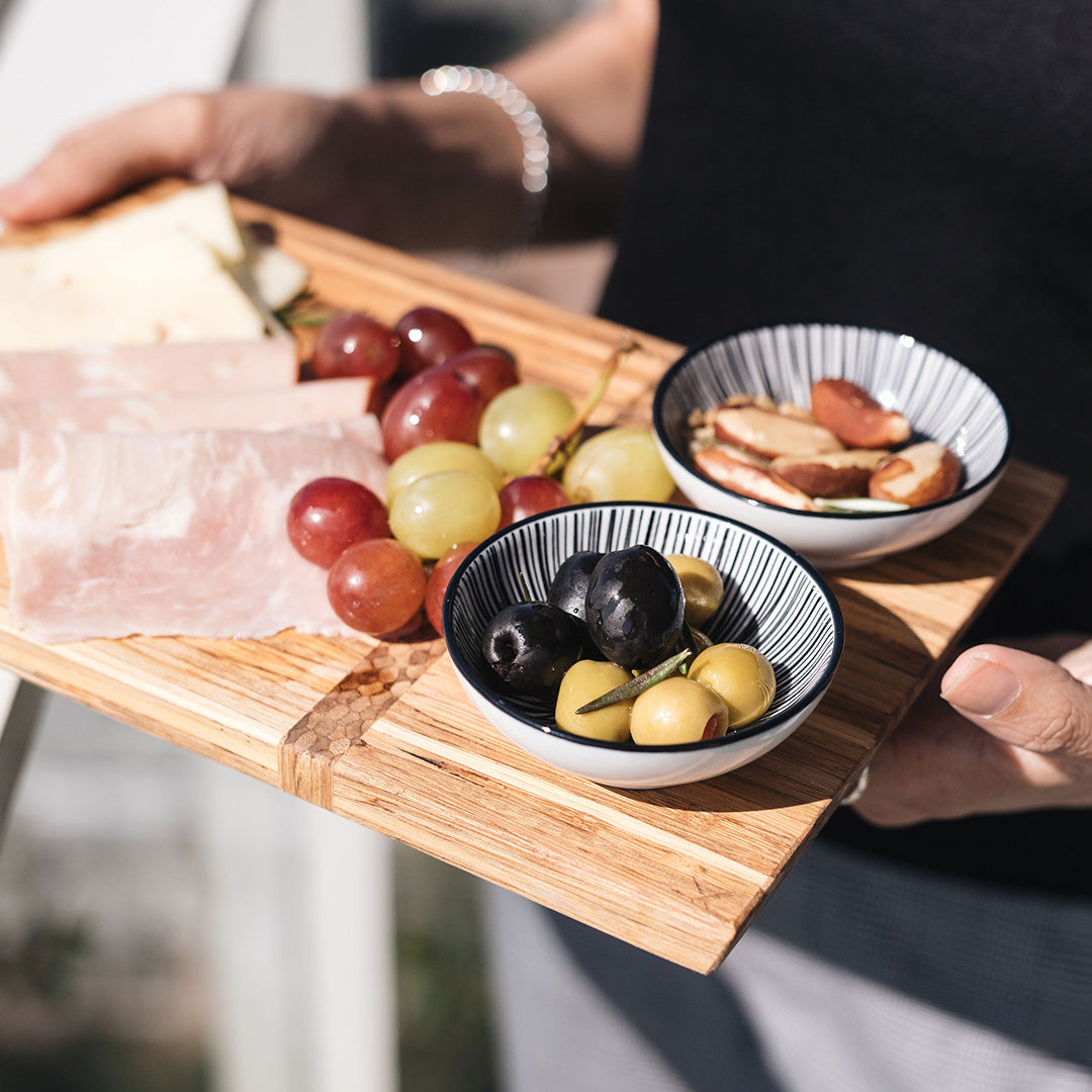 Silver inlay onto monkeypod wood selling Wine caddy, cheese board & trivet/beverage coaster set.